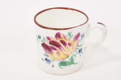 Lot 246 - 18th century English small porcelain cup, probably Bristol c.1770. Decorated in polychrome with flowers. 4.7cm high