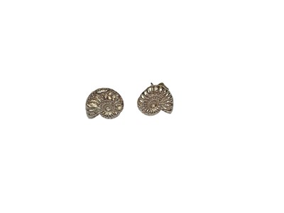 Lot 253 - Pair of contemporary silver ammonite fossil stud earrings with post and butterfly fittings, 11mm wide (London 2021)