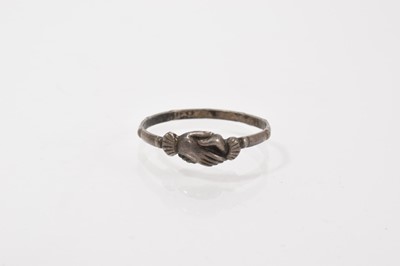 Lot 692 - Antique, possibly 18th century, white metal fede ring with clasped hands and a beaded band