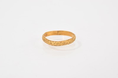 Lot 695 - Georgian 18th century yellow metal ring with a geometric chequerboard design to the band. Ring size H