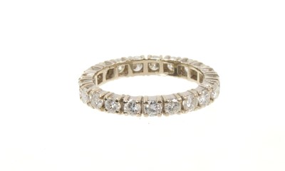 Lot 564 - Diamond full band eternity ring, French hallmarks
