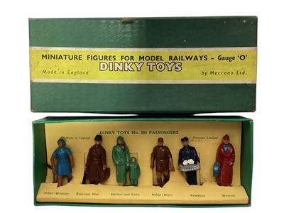 Lot 1787 - Dinky Toys O Gauge No.003 Passenger Set, boxed and three railway staff (1)