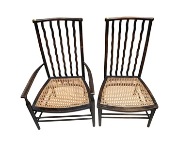 Lot 5308 - Pair of antique Arts & Crafts Morris type ebonised chairs with cane seats, one with arms and other without