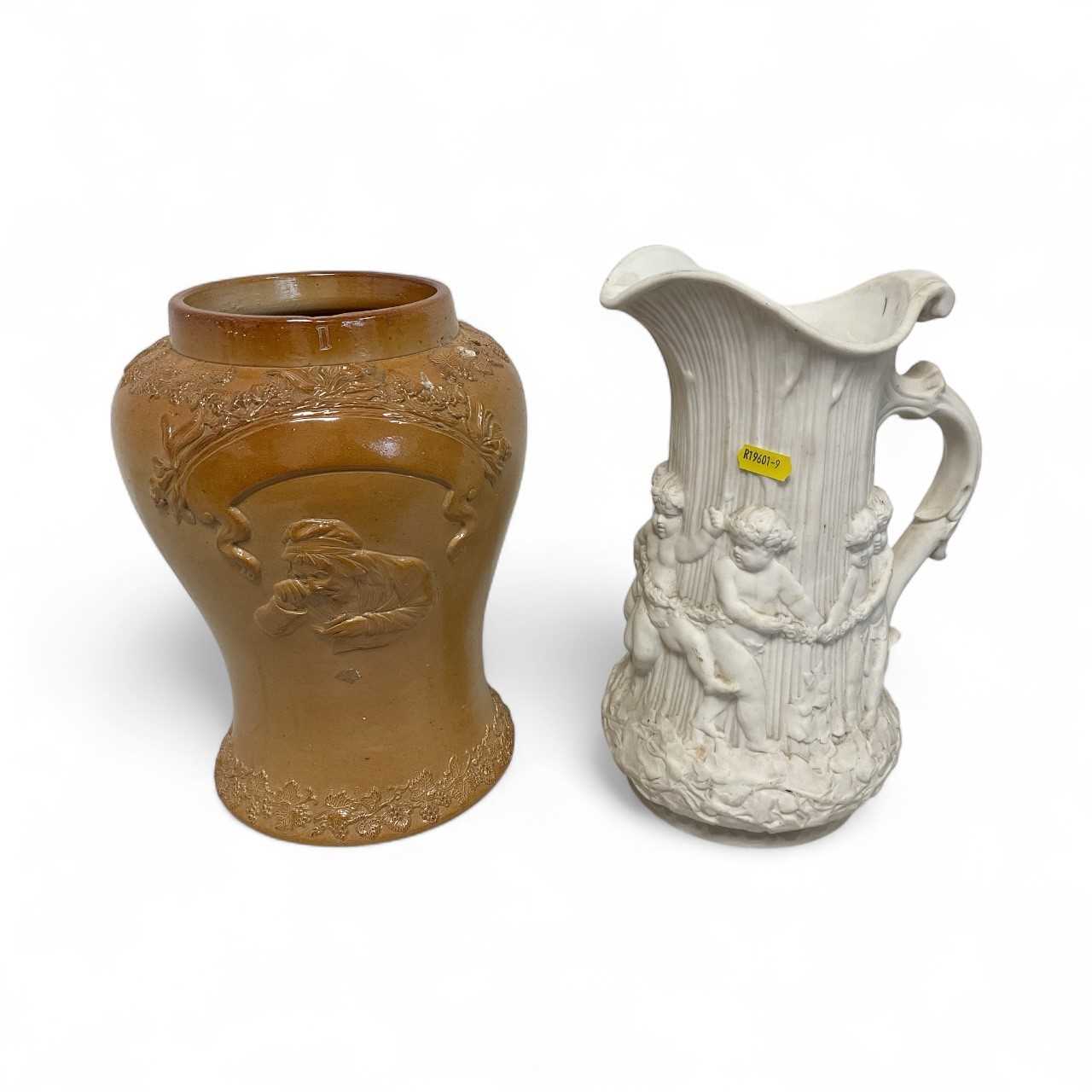 Lot 5001 - Victorian stoneware tobacco jar decorated in relief with a woman taking snuff, together with a antique parian jug