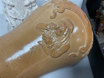 Lot 5001 - Victorian stoneware tobacco jar decorated in relief with a woman taking snuff, together with a antique parian jug