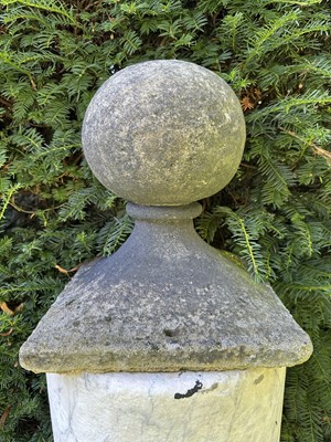 Lot 1948 - Pair of reconstituted garden balls on flared square bases, 35.5cm square x 38cm high