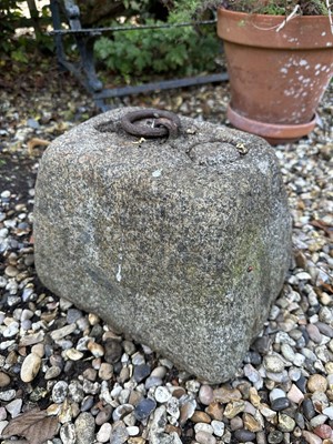 Lot 1961 - Antique granite weight of rectangular tapered form with iron ring handle, 23cm high