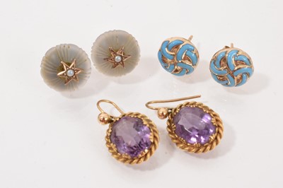 Lot 583 - Three pairs of earrings to include amethyst pendant earrings, turquoise enamel and yellow metal earrings and a pair of seed pearl star and crystal/frosted glass earrings (3)