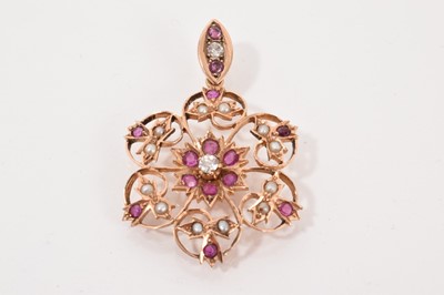 Lot 587 - Edwardian diamond, ruby and seed pearl snowflake pendant