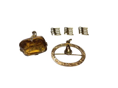 Lot 98 - Edwardian 9ct gold mounted citrine fob, Edwardian 9ct gold buckle shaped pendant and three spare yellow metal watch links