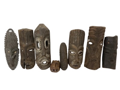 Lot 874 - Group of eight tribal masks, Zaire, the largest 36cm high