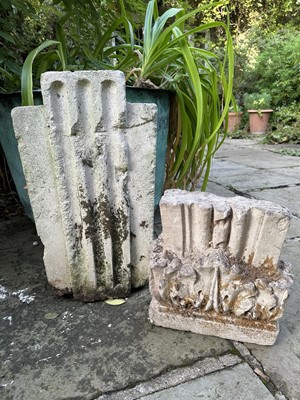 Lot 1966 - Antique carved stone corbel with central fluted panel, 57cm high x 33cm wide, together with another stone fragment (2)