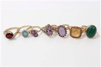 Lot 3463 - Seven gold (9ct) gem set dress rings