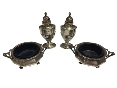 Lot 81 - Pair of Edwardian silver condiments with blue glass liners and pair of silver pepperettes