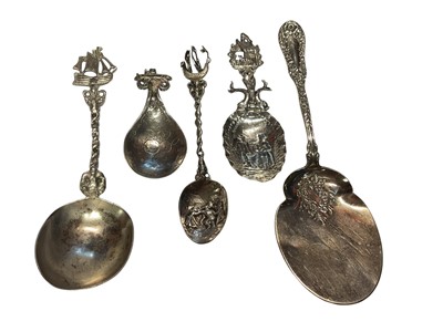 Lot 82 - Four Dutch silver caddy/other spoons and a sterling silver serving spoon (5)