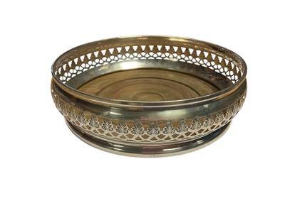 Lot 126 - Silver wine coaster with pierced decoration (London 1971), 13.5cm diameter