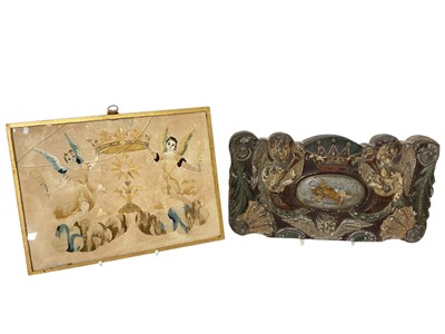 Lot 1883 - 18th century silk embroidered double sided picture, seraphim and crown ornament, glazed 16 x 21cm, together with an embossed tin plaque with similar ornament. (2)