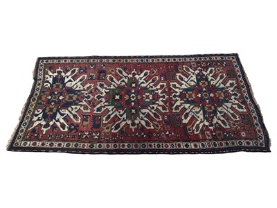 Lot 5307 - Caucasian rug with floral design measuring approximately 241cm X 135cm