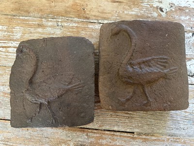 Lot 1891 - Pair of ancient relief moulded tiles, each with raised bird, 19 x 21cm