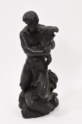 Lot 209 - Wedgwood black basalt candlestick in the form of Triton, marked to base, 28cm high