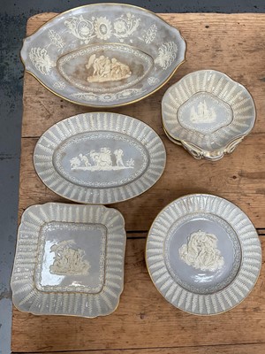 Lot 10 - 19th century English relief decorated lilac-ground dessert service, with four other 19th century blue glazed plates