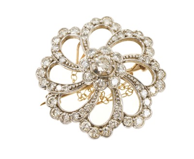 Lot 660 - Victorian style diamond brooch in the form of a Catherine wheel