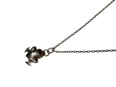 Lot 4 - Georg Jensen Danish silver frog pendant no. 31, on a long white metal chain