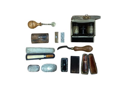 Lot 2942 - Pair of Edwardian opera glasses in original box, two cigar holders, two cigar cutters, four Victorian snuff boxes, vesta case and two antique leather working tools