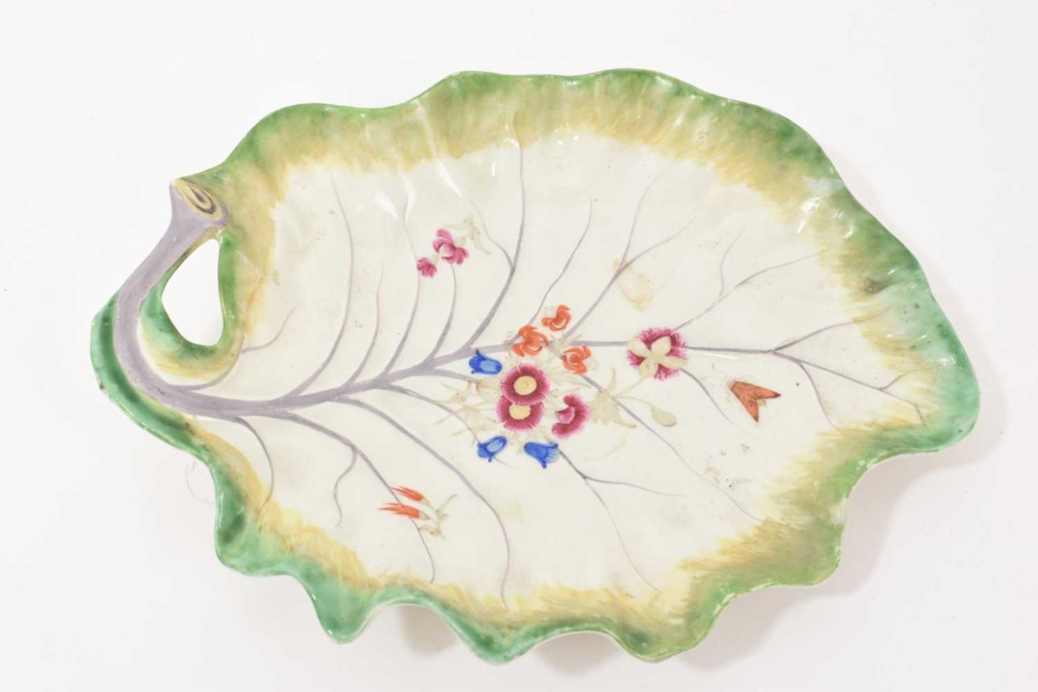 Lot 64 - Worcester cabbage leaf shaped dish, painted with flowers, circa 1770