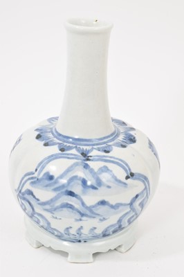 Lot 258 - South East Asian blue and white lobed bottle shaped vase
