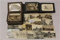 Lot 2427 - PostCarsds in two albums - including real...