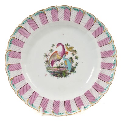 Lot 221 - Chelsea plate, painted with birds, within a puce ‘feather’ border, circa 1760