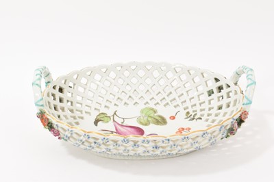 Lot 224 - Chelsea large oval two handled basket, painted with fruits, circa 1760