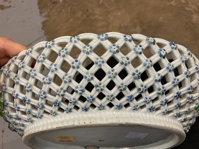 Lot 49 - Chelsea large oval two handled basket, painted with fruits, circa 1760