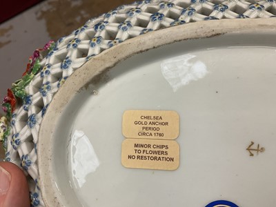 Lot 49 - Chelsea large oval two handled basket, painted with fruits, circa 1760