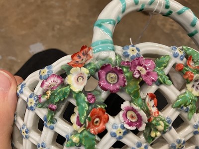 Lot 49 - Chelsea large oval two handled basket, painted with fruits, circa 1760