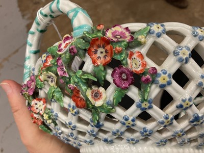 Lot 49 - Chelsea large oval two handled basket, painted with fruits, circa 1760