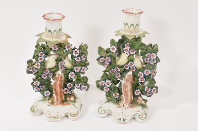 Lot 266 - Pair of Derby ‘birds in branches’ candlesticks
