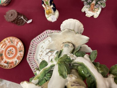 Lot 57 - Pair of Derby ‘birds in branches’ candlesticks