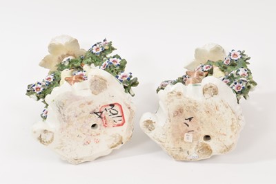 Lot 57 - Pair of Derby ‘birds in branches’ candlesticks