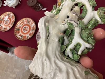 Lot 57 - Pair of Derby ‘birds in branches’ candlesticks