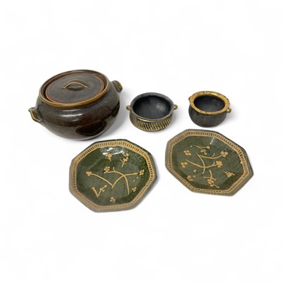 Lot 1903 - Group of ceramics, including a studio pottery speckle glazed vessel and cover, together with two black earthenware bowls with gilt decoration, and a pair of green glazed stoneware dishes with fo...