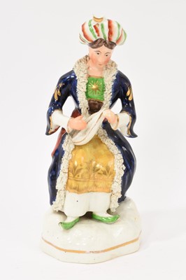 Lot 265 - Staffordshire porcelain figure of a female Turk, circa 1840-50