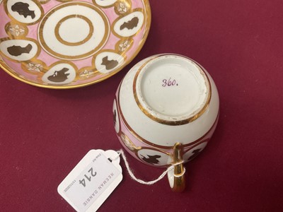 Lot 54 - Coalport trio, unusually painted with profile silhouettes, on a pink ground, circa 1805, pattern number 360