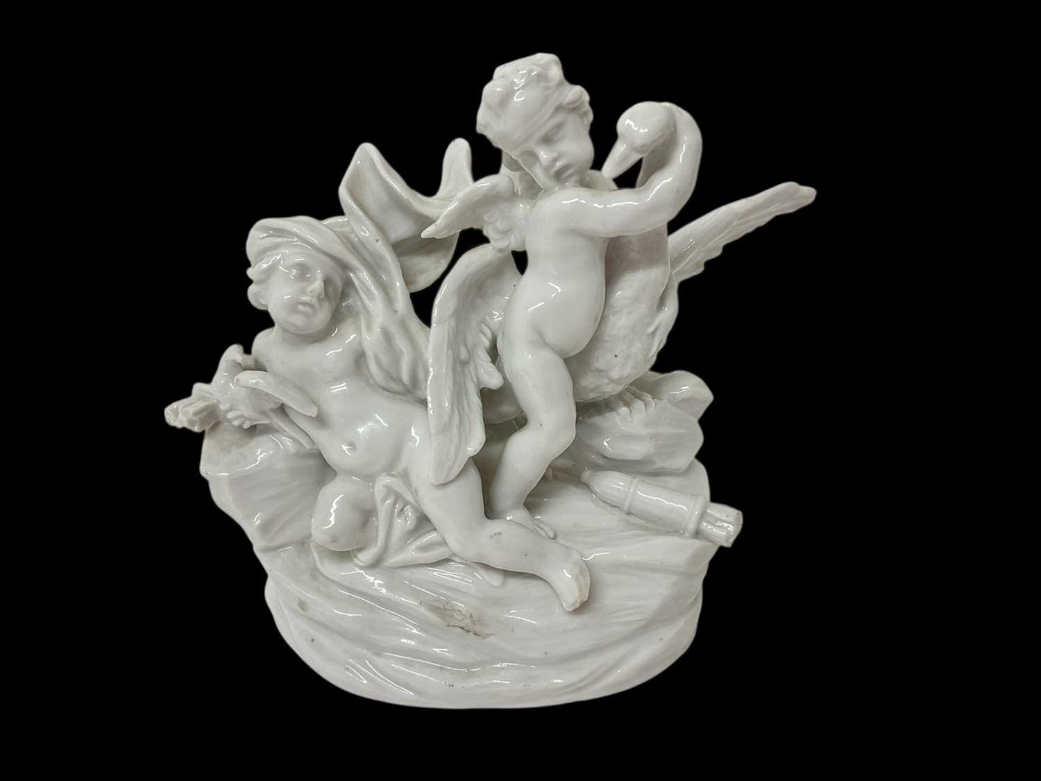 Lot 66 - Italian porcelain group of two putti and a swan