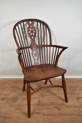 Lot 1215 - Early 19th century yew wood Windsor chair