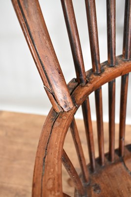 Lot 1215 - Early 19th century yew wood Windsor chair