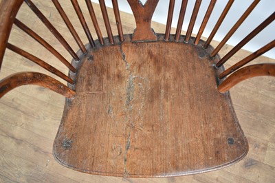 Lot 1215 - Early 19th century yew wood Windsor chair
