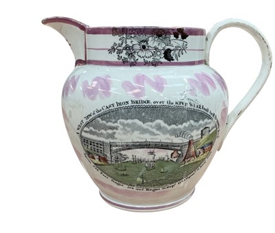Lot 438 - 19th century Sutherland luster pottery jug depicting The Cast Iron Bridge