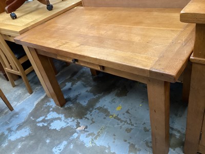 Lot 1336 - Oak dining table and two chairs